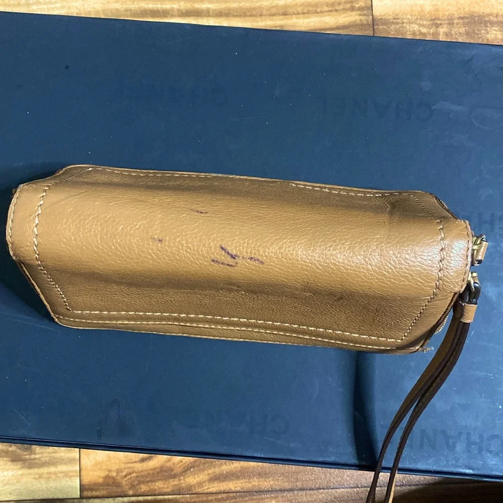 Coach stitched leather